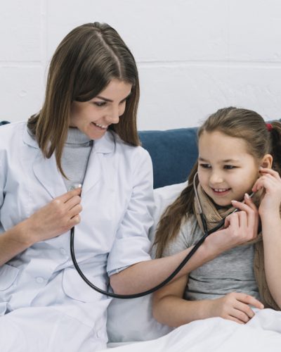 close-up-patient-s-girl-listening-heart-beat-smiling-female-doctor-with-stethoscope_23-2148053232